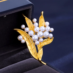 Vintage matte gold lily of the valley brooch with white pearls for elegant suits