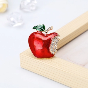Elegant red apple brooch with green leaf and sparkling rhinestones on golden base