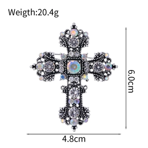 Vintage silver hollow cross brooch with sparkling crystals and iridescent AB rhinestones
