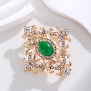 Spilla barocca vintage con gemma verde e strass su base in lega dorata