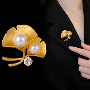 Ginkgo leaf brooch in matte gold finish with white pearls and sparkling zircon