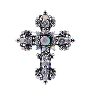 Vintage baroque silver cross brooch with crystals for suits and coats on white background