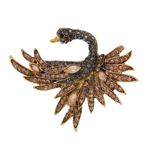 Elegant hummingbird brooch with amber and champagne crystals on vintage gold alloy base