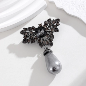 Vintage dark metal floral necklace with black crystals and a grey pearly drop pendant