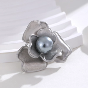 Elegant gold-plated flower stud earrings with a grey pearl center and matte petals