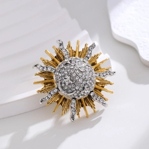 Vintage sunburst alloy brooch with sparkling rhinestones in gold and silver finish