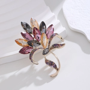 Luxurious crystal flower bouquet brooch with marquise gemstones on a gold-plated base