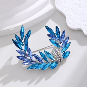 Elegant blue crystal wheat ear brooch in crescent shape with polished silver setting