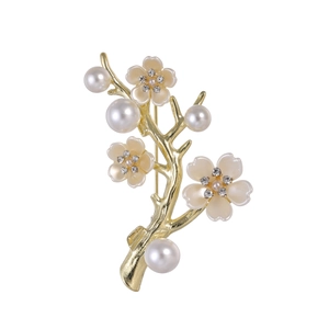 Élégante broche branche de prunier dorée avec perles et strass brillants pour femmes