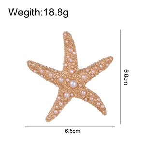 Eleganter Seestern-Brosche mit cremefarbenen Perlen, 6,5 cm breit und 6,0 cm in der Höhe