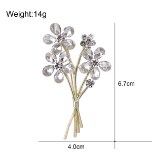 Broche bouquet de fleurs exquis doré avec cristaux, taille 6,7 cm x 4,0 cm