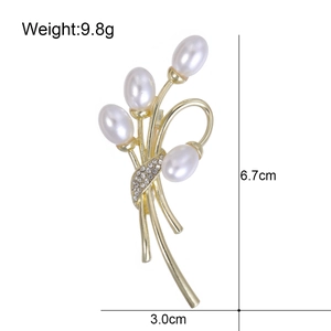 Spilla floreale con perle e finitura dorata con strass, misure 6,7 cm per 3,0 cm