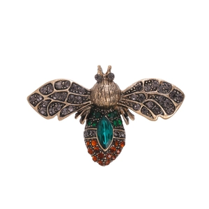 French vintage bee brooch in antique gold finish with emerald green crystals and rhinestones