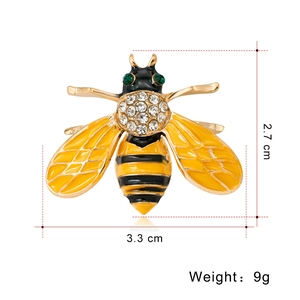 Detail of bee brooch with yellow enamel, rhinestones and 3.3cm width dimension