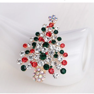 Élégante broche sapin de Noël avec strass colorés sur une base en métal doré