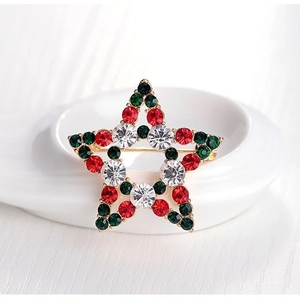 Broche étoile de Noël avec strass rouges et verts sur une base en alliage doré chic