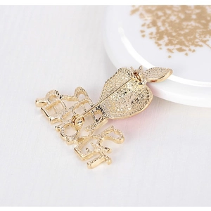 Christmas apple brooch in gold-plated hollow metal with sandblasted finish back view