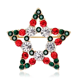 Broche étoile de Noël avec strass rouges et verts sur monture en alliage doré