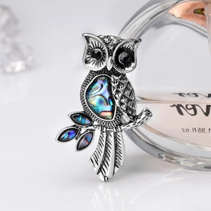 Vintage owl brooch in antique silver finish with iridescent abalone shell inlay