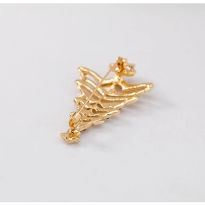 Golden alloy Christmas tree brooch with back pin fastener and star detail
