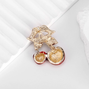 Creative cherry fruit brooch with red lips design and golden alloy pin closure