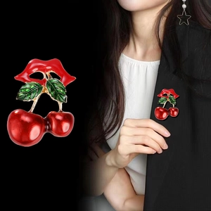 Creative cherry brooch with red lips design in polished enamel finish for suits