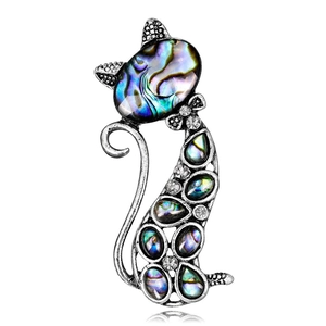 Broche chat en argent vintage ornée de nacre d'abalone irisée et de cristaux brillants
