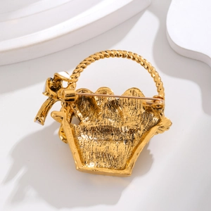 Vintage gold flower basket brooch with butterfly detail and secure pin back clasp