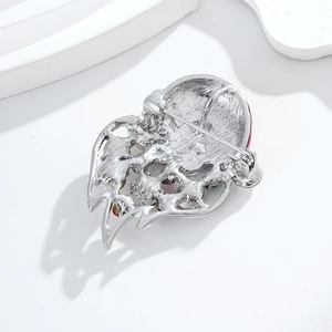 Rear view of silver Santa Claus brooch with secure metal pin and 3D textured alloy back
