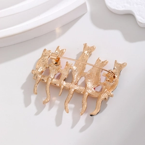 Golden alloy cartoon cat brooches with detailed back texture and safety pin clasp
