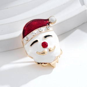 Spilla Babbo Natale in smalto con cappello rosso glitterato e strass su base bianca
