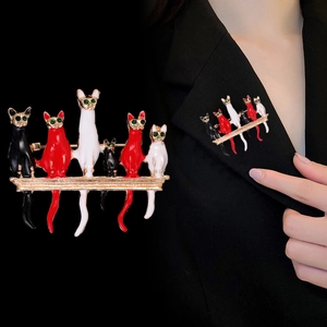 Cartoon enamel cat brooches on gold bar with green gem eyes for suits and jackets