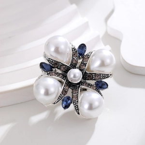 Vintage baroque cross brooch with white pearls, dark blue crystals and silver metal finish