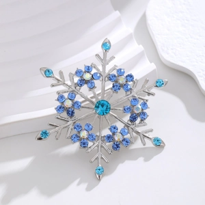 Élégante broche flocon de neige avec cristaux bleus et strass pour costume femme