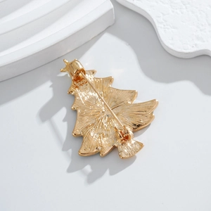 Gold Christmas tree brooch back view with durable metal pin and safety clasp closure