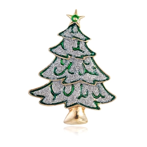 Broche sapin de Noël dorée avec émail vert et détails argentés étincelants