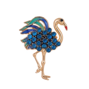 Elegante broche de flamenco con cristales azules y esmalte en base dorada