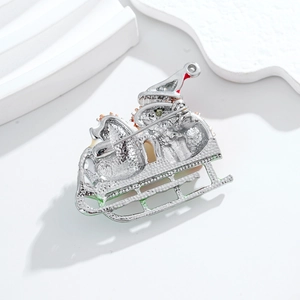 Christmas sleigh animal brooch with silver plating and colorful enamel detail
