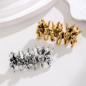 Vintage Engel Broschen in Gold und Silber mit klassischem Amoretten-Gruppendesign