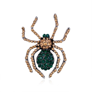Spilla a ragno vintage con cristalli verdi e champagne su base in lega d'argento