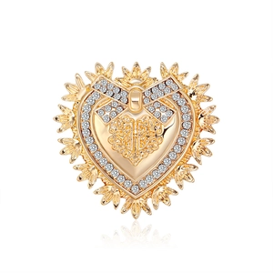 British style heart badge brooch in gold alloy with rhinestones and elegant bow detail