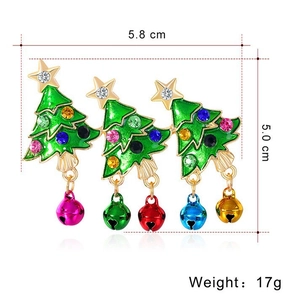 Christmas tree brooch with green enamel and multi-colored bells on a white background