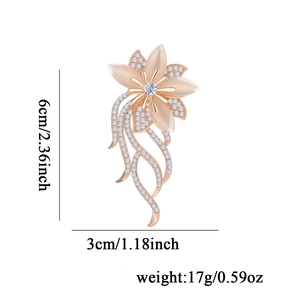 Broche fleur œil de chat élégante plaquée or rose avec pampilles en cristal scintillantes