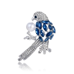 Broche perroquet élégante avec pierres bleues et strass blancs sur alliage argenté