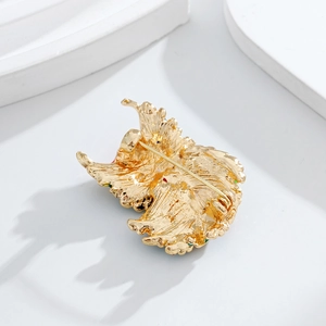 Exquisite gold-plated owl brooch featuring fine texture and secure pin clasp on the back