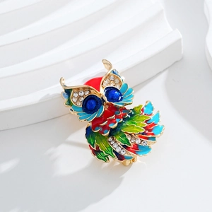 Elegant owl brooch with multi-colored enamel and sparkling rhinestones on gold base