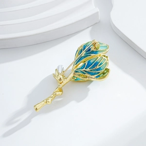 Floral enamel brooch with blue gradient petals and white pearl on gold-tone metal base