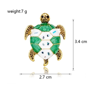 Vintage sea turtle brooch with green enamel inlay and gold base, 3.4 cm size
