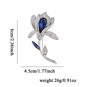 Élégante broche fleur tulipe en alliage argenté avec strass et cristaux bleus