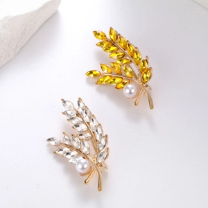 Elegant wheat stalk brooches with crystal rhinestones and white pearls set in gold